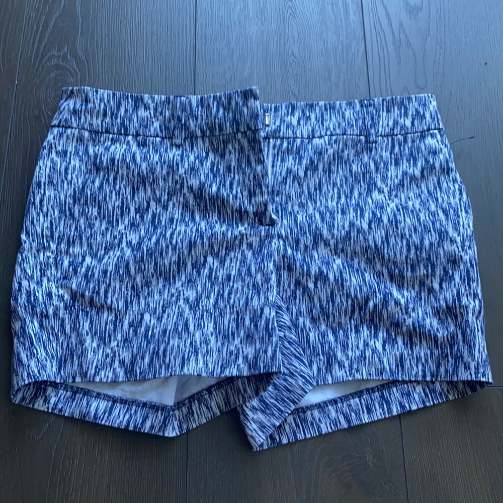Never worn mid-length golf shorts